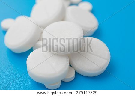 Pharmacetic Concept: Pills Top View On Blue Background