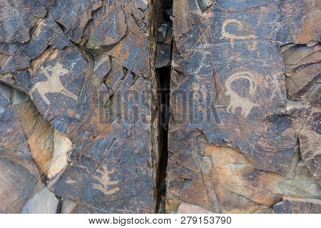 The Ancients Petroglyphs In Tamgaly Tash In Kazakhstan