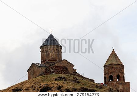 Gergeti Trinity Church (tsminda Sameba), Holy Trinity Church Near The Village Of Gergeti In Caucasia