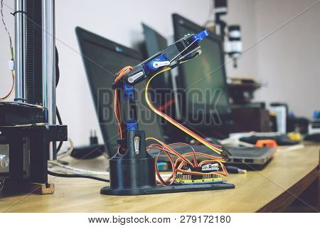 3D Printed Robot Arm With Wires And Control Board. Plastic Manipulator, Robotic Hand Machine Tool Pr