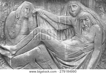 Bas-relief Representing The Pity Of Michelangelo. Holy Mary Mother And Jesus Christ After The Crucif