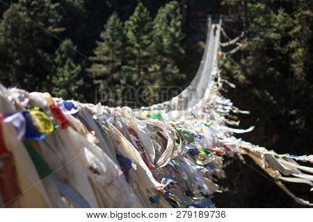 Suspension Bridge Over The Mountain Gorge In Sagarmatha National Park, Himalayas, Nepal. Exquisite P