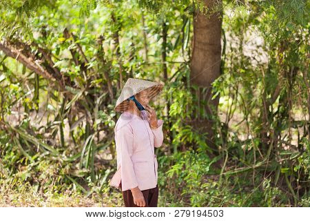 Vietnam-december 26, 2013. Close Up Unidentified Vietnamese Woman At Countryside On December 26, 201