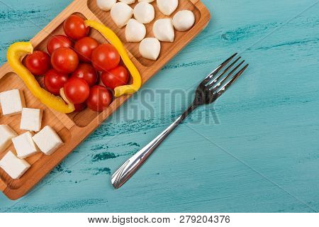 Cheese Compartmental Dish With Different Cheeses, On Rustic Wooden Background.