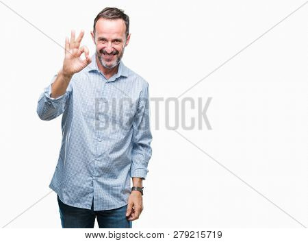 Middle age hoary senior business man over isolated background smiling positive doing ok sign with hand and fingers. Successful expression.