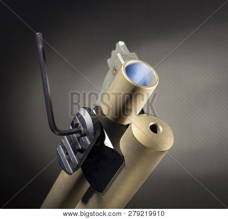 Tool Being Used To Tighten A Weaponlight Rail Adapter On A Shotgun