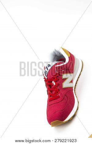 Boston, Ma, Usa, January 2019 - New Balance Nb 574 Athletic Shoes On Studio Background. New Balance 