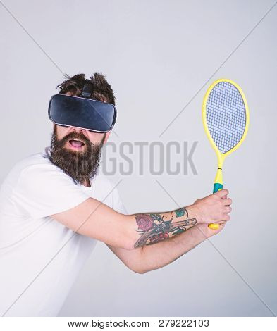 Man With Hipster Beard Playing Tennis In Virtual Reality, Sport Concept. Bearded Man In Vr Goggles D