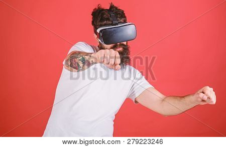 Virtual Racing Concept. Hipster On Confident Face Driving Bike On High Speed In Virtual Reality. Guy