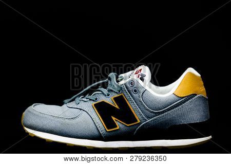 Boston, Ma, Usa, January 2019 - New Balance Nb 574 Athletic Shoes On Studio Background. New Balance 