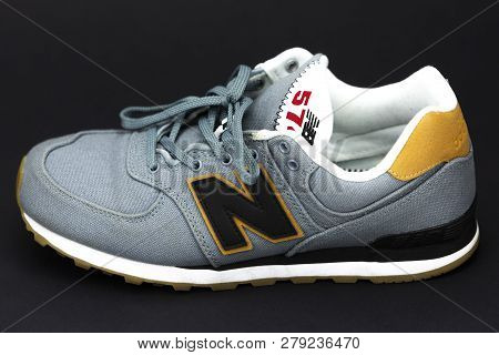 Boston, Ma, Usa, January 2019 - New Balance Nb 574 Athletic Shoes On Studio Background. New Balance 