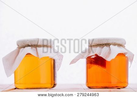 Bottled Organic Kombucha Mushroom With Tea In Jars Isolated On White