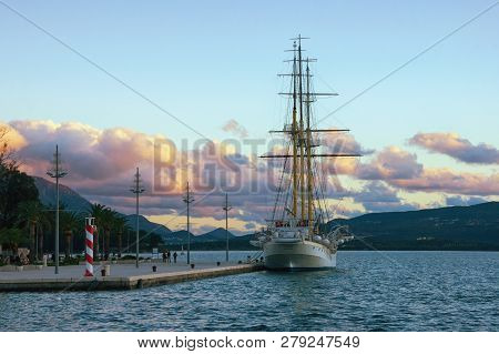Tivat, Montenegro - December 09, 2018:  View Of Embankment Of Tivat City With Old Training Ship Jadr