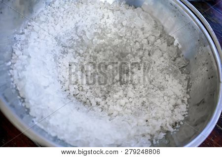Crushed Ice Mixed With Salt In Stainless Bowl Prepared For Making Homemade Ice Cream. Traditional Co