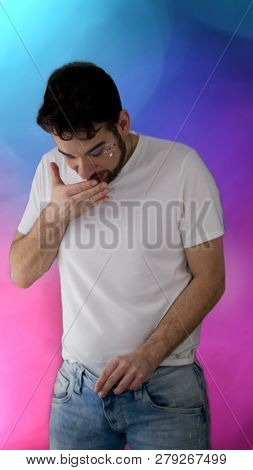 Transvestite - The Man Looks In Surprise At Something In His Trousers.he`s A Woman. A Man With A Bea