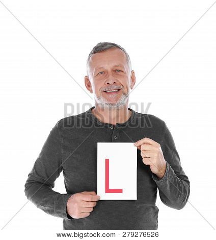 Happy Mature Man With L-plate On White Background. Getting Driving License