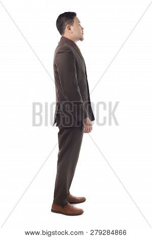Young Asian Businessman Standing Side View