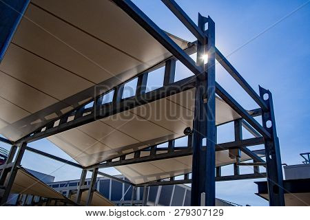 Sail Shade Pergola Made Of Galvanized Steel And White Canvas Tall Standing Strong Structure Against 