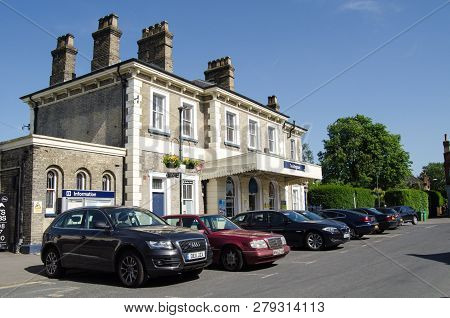 Teddington, Uk - May 17, 2018: Cars Parked Outside The Railway Station At Teddington, Middlesex.  Tr