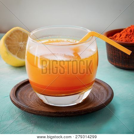 A Warm Drink From Turmeric, Lemon And Honey For Better Health. Immunostimulating Natural Cocktail. C