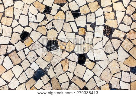 Closeup Of Neutral Coloured Beige And Black Abstract Mosaic Ceramic Tiles Patterned Background