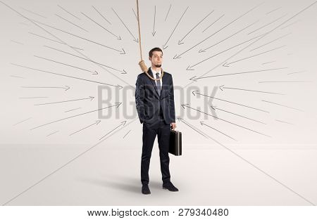Hopeless young businessman trying to suicide with question signs concept