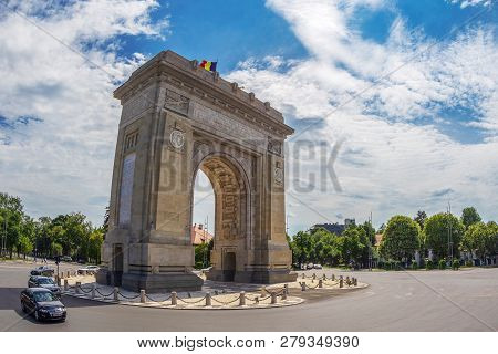 Bucharest, Romania - July 17, 2018: Triumphal Arch With Flag, Landmark Architecture In The Northern 