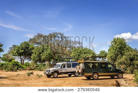 Tsavo East Reserve, Kenya - October 12, 2018: Safari Cars On Adventure Trip In Tsavo East National P