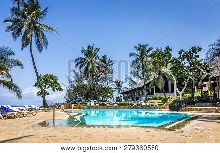 Diani Beach, Kenya - October 09, 2018: Beautiful Scenery Of African Luxury Resort With Empty Swimmin