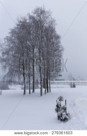 Church In Winter With Trees And Snow