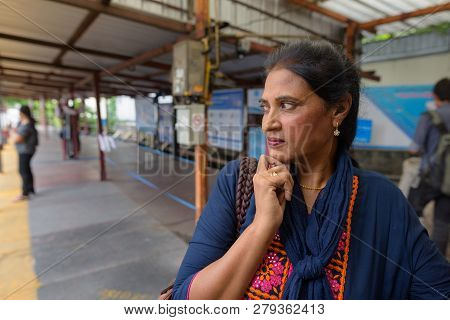Indian Woman At Canal Boat Station In Bangkok Thailand