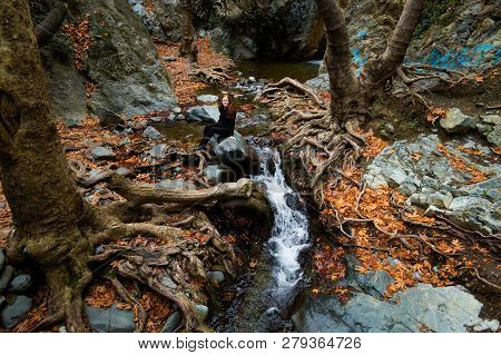 Young Caucasian Tourist On Beautiful Hiking Trail To Millomeris Waterfall During Trekking. Landscape