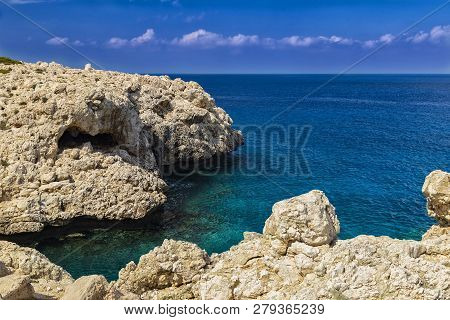 Seascape With Rocks , Turquoise Sea And Blue Sky , Shore Of The Mediterranean Sea. Coast Of Island C