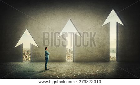 Confident Pensive Businessman With Arms Crossed Thinking Alone In Front Of Rising Graph Arrows Shape