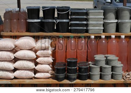Bags Of Salt, Jars Of Curative Mud, Bottles Of Curative Salt Solution Standing On The Counter On The