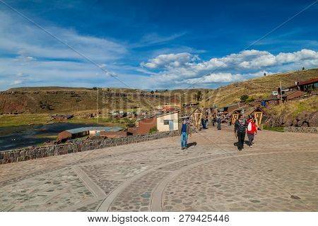 Sillustani, Peru - May 14, 2015: Tourists On Their Way To Sillustani Funeral Towers.