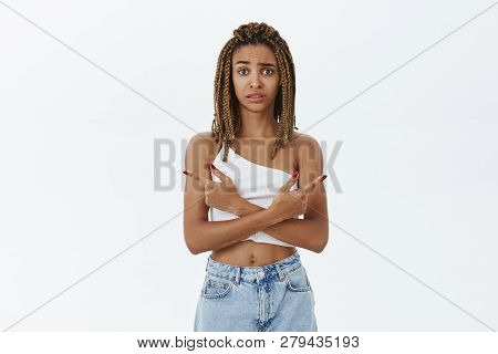 Worried Unsure Hesitating Insecure African American Young Woman With Cool Dreadlocks Frowning Pointi