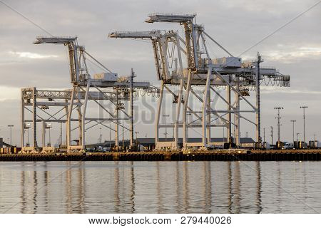 Shipping Container Cranes In The Port Of Oakland. Oakland Estuary, California, Alameda County, Usa.