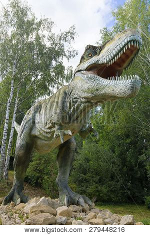 Kotelnich, Russia - August 30, 2017: Sculpture Of Tyrannosaurus Rex Close Up In Dinopark