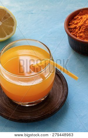 A Warm Drink From Turmeric, Lemon And Honey For Better Health. Immunostimulating Natural Cocktail. C