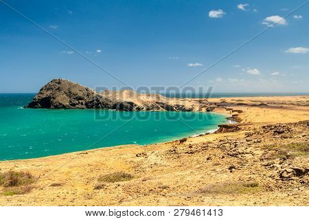 Coast Of La Guajira Peninsula In Colombia. Pilon De Azucar Hill In The Background.