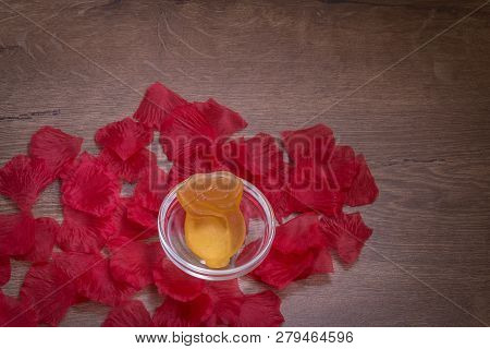 Rose Flower Made Of Soap Soap In Glassware On Wooden Table With Rose Petals. Background For Copy Spa