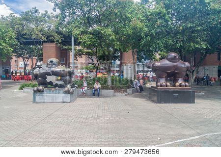 Medellin, Colombia - September 1, 2015: Twin Statues Of Bird Of Peace In San Antonio Park By Fernand