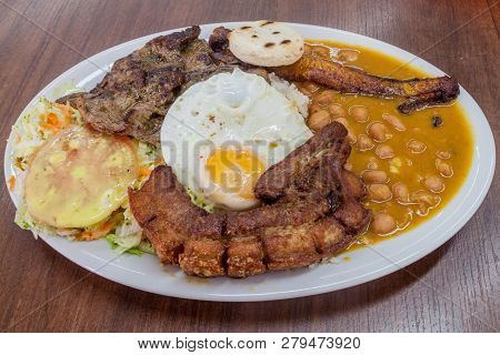 Bandeja Paisa. Typical Meal From Antioquia In Colombia