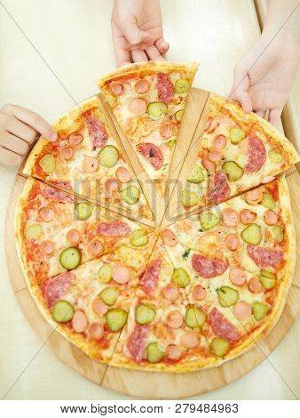 Above View Of Pizza Taken By Children