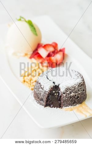 Chocolate Lava Dessert With Ice Cream - Selective Focus