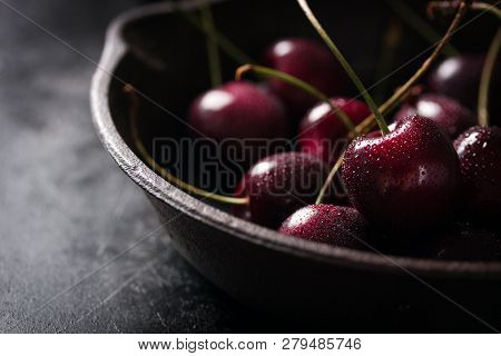 Closeup Of Fresh Red Cherry On An Old Pan With Copy Space, Horizontal