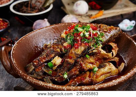 Fried Yellow Croaker In A Ceramic Dish