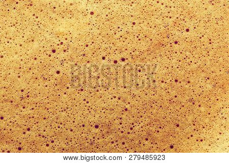 Coffee Close Up Background, View From The Top On Natural Foam.