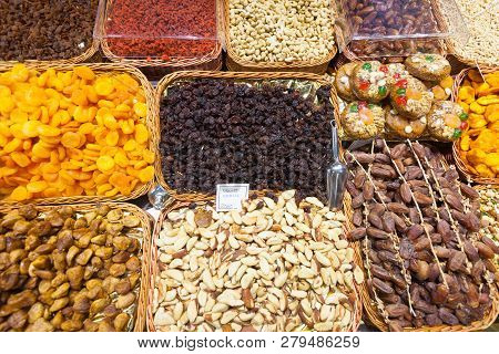 Dried Fruits And Nuts On  Counter At Spanish Market